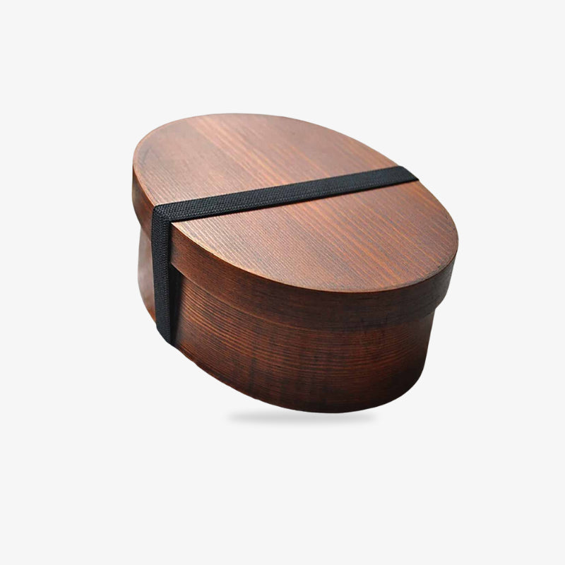 Wooden bento box traditional with a black strap on a white background