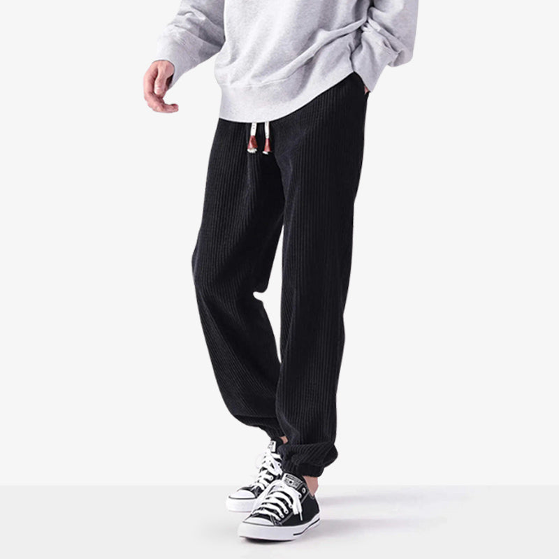 This black Biraki corduroy pants with loose fits and textured fabric, reflecting traditional Japanese garment inspiration.
