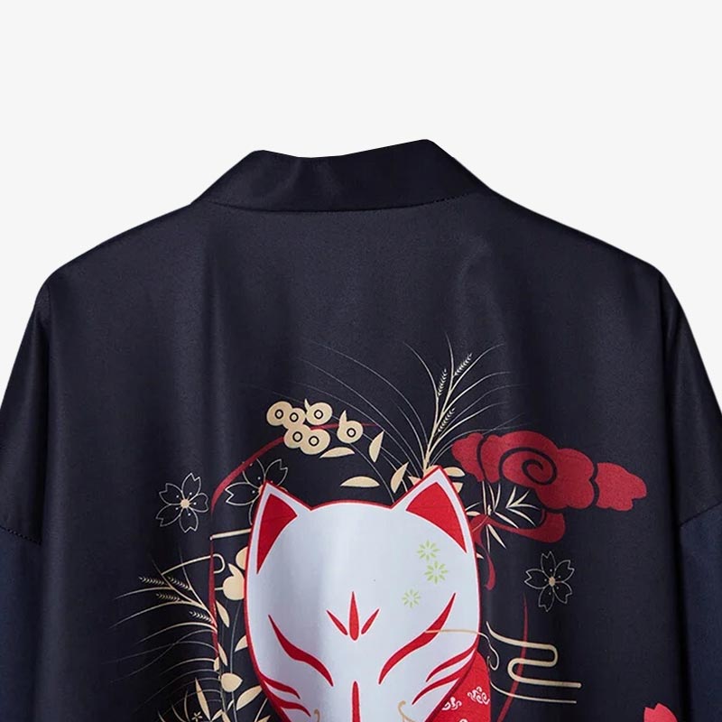 The black kitsune jacket features a striking design with a Japanese Kitsune fox mask on the back, combining traditional aesthetics with a sleek black style