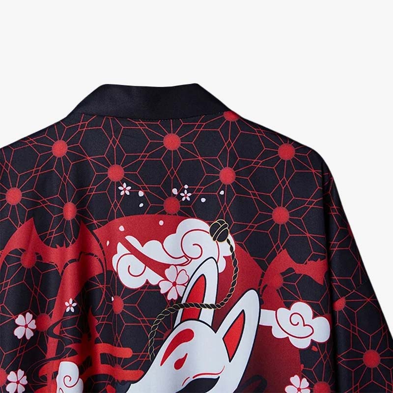 This elegant kimono jacket in black is beautifully decorated with sakura flowers, a Japanese Kitsune mask