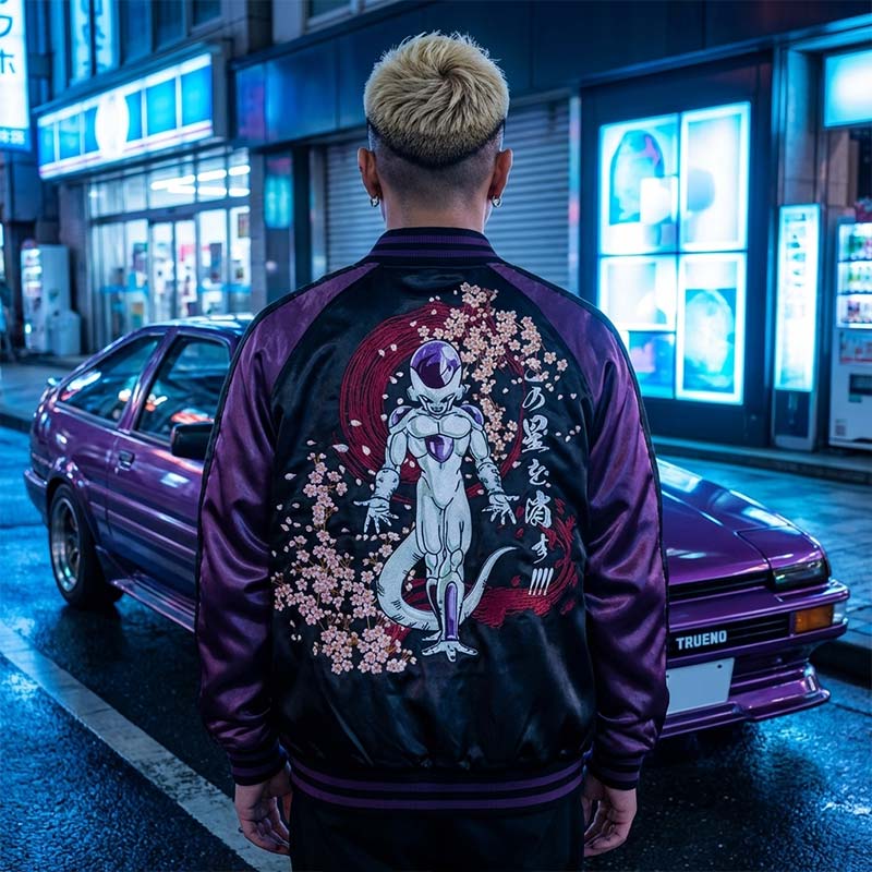 Person wearing a freezer bomber jacket design on the back, standing in front of a purple car in an urban Tokyo Street.