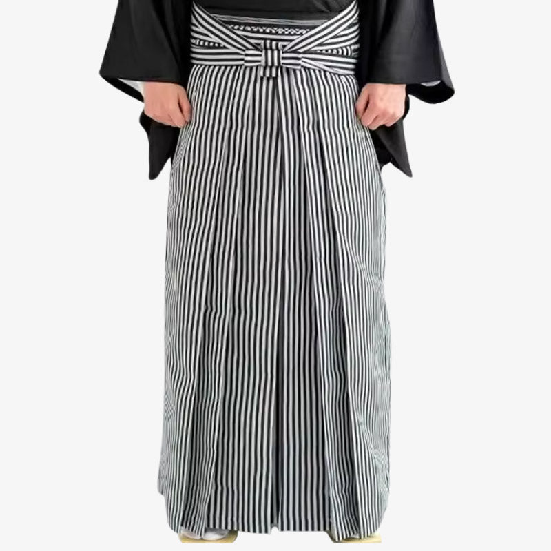 Hakama kimono featuring traditional wide-legged pleated pants paired with a classic kimono top, embodying Japanese cultural heritage. The men japanese hakama has black strippes