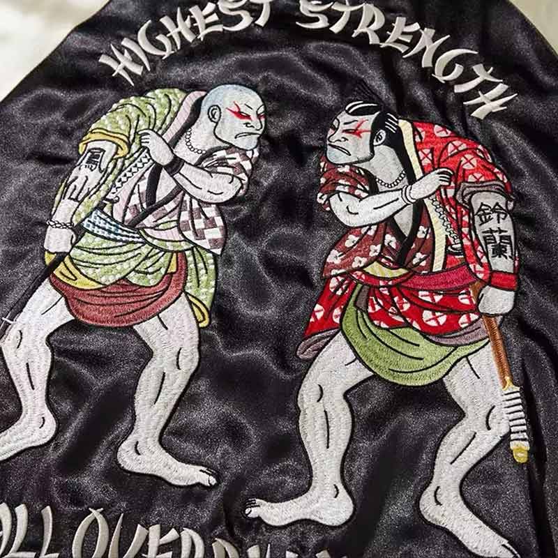 Japanese bomber jacket featuring an embroidered design of two sumo wrestlers in ukiyo-e style, celebrating traditional Japanese culture and artistry.