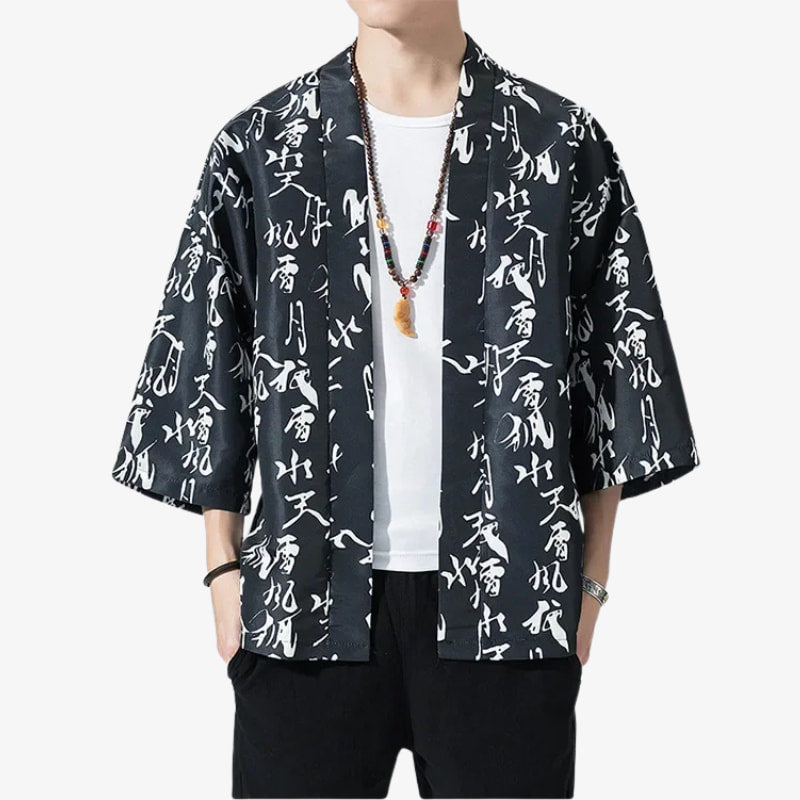 Person wearing a black Japanese jacket haori inspired by kimono-style with white kanji text patterns on a white background