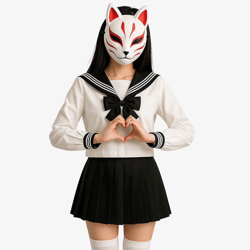 A person wearing a Japanese sailor uniform, including a white blouse with a black bow and a black pleated skirt, accessorized with a fox-like mask.