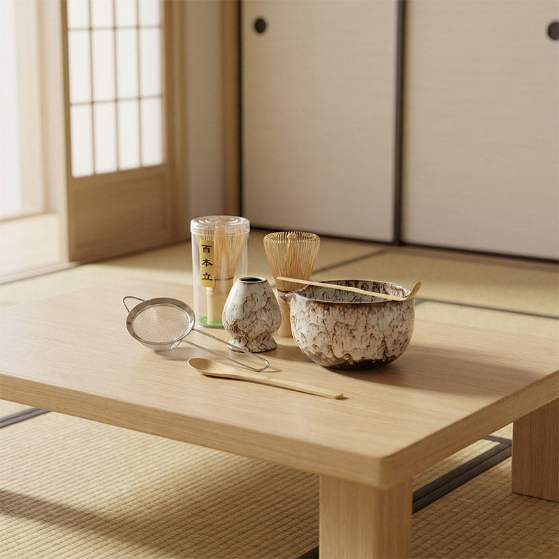 Japanese Tea-making utensils on a wooden table in a traditional Washitsu room.