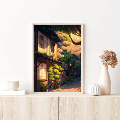 This Japanese kyoto painting is in a wooden frame on a light wood chest of drawers.