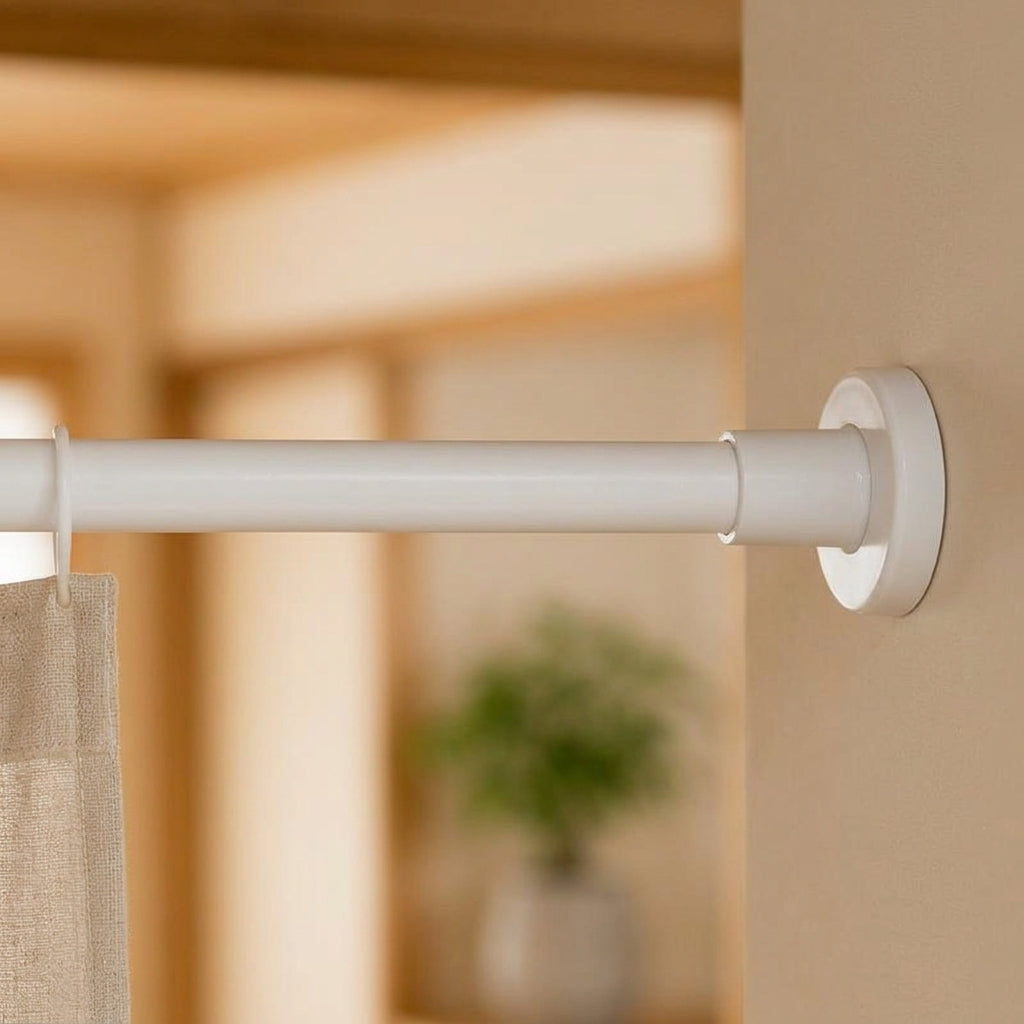 No-drill curtain rod holding a Japanese noren in a modern painted doorway
