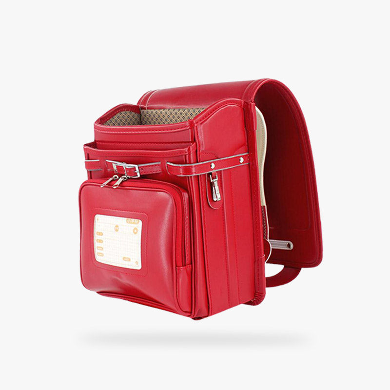 This randoseru red bag is practical with multiple pockets. It's a traditional Japanese bag