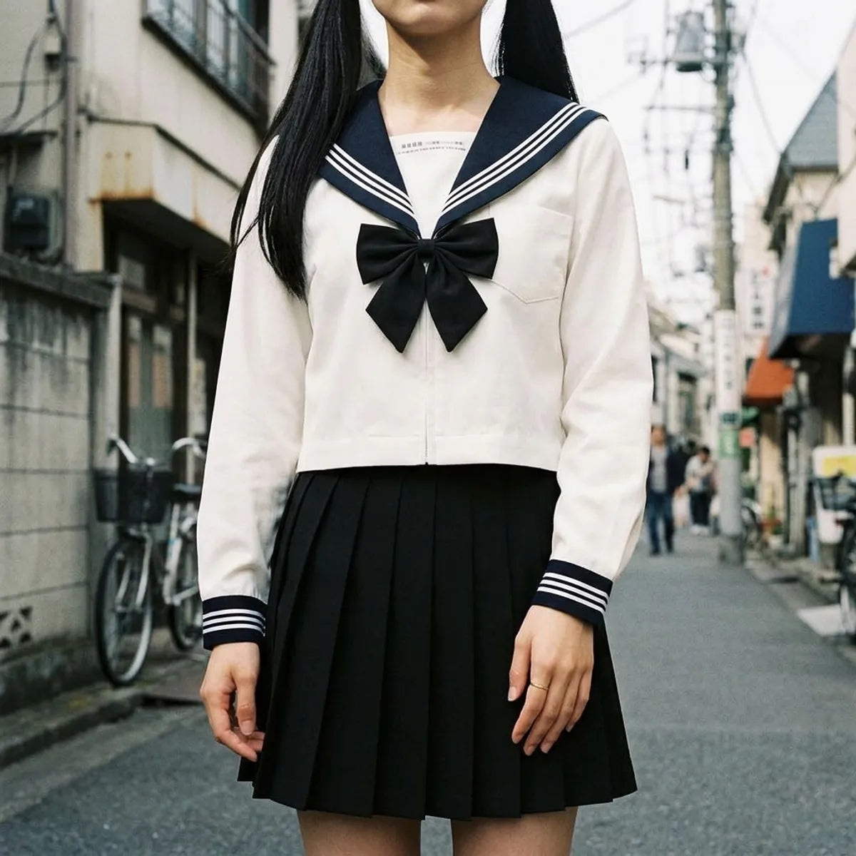 Sailor uniform blouse worn with jeans showing an everyday styling option