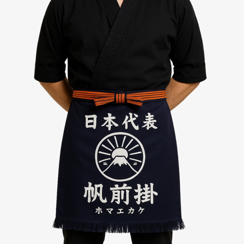 Traditional cooking apron in navy cotton with white kanji, reflecting authentic Japanese design and high-quality craftsmanship.