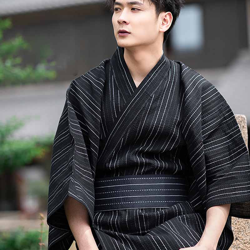 A samurai wears a traditional Japanese belt kimono men with a black striped kimono