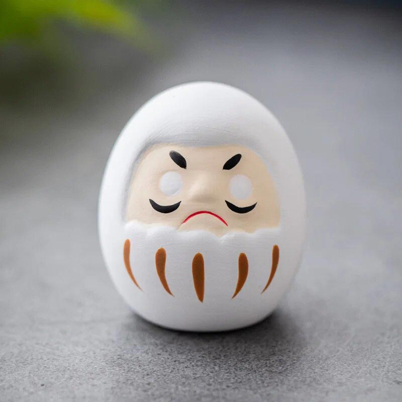 The white japanese daruma dolls is perfect for japanese home decor. Daruma White is painted