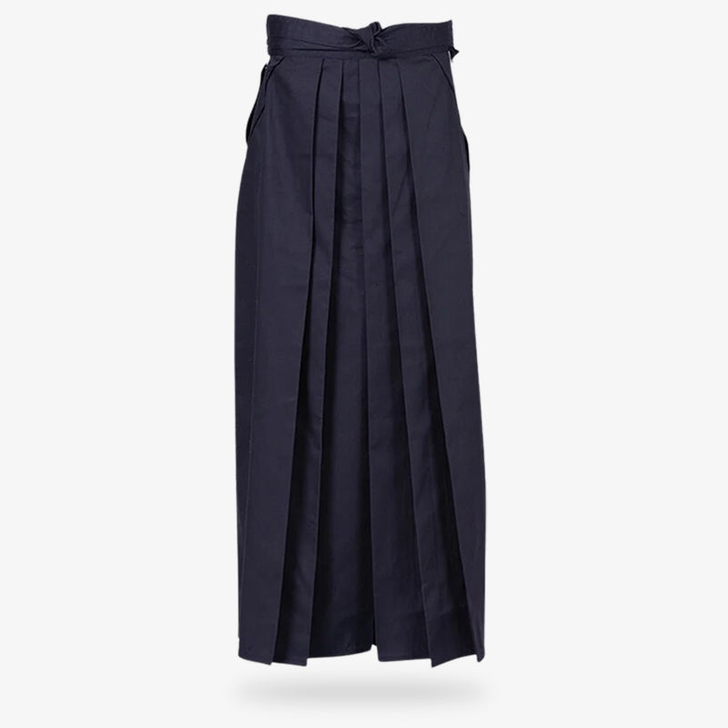A person practicing Aikido wearing a traditional women blue Hakama pants in navy blue