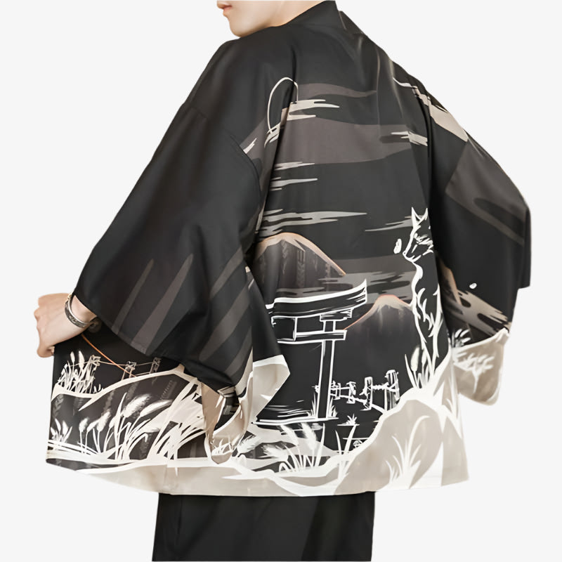 Person wearing a black Kitsune jacket kimono with white patterns From a Japanese Fox and a torii door