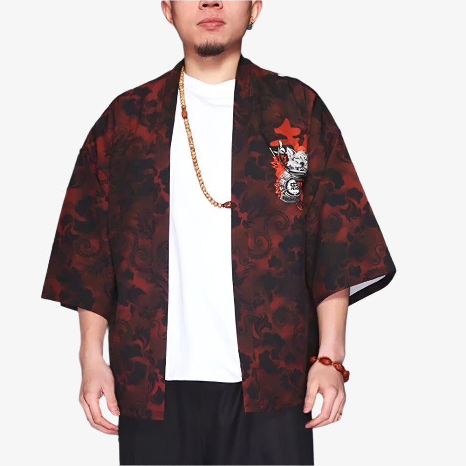 Person wearing a red and black patterned samurai kimono over a white shirt on a white background