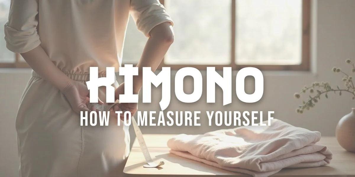 Hands pulling a soft measuring tape across upper back; folded kimono on wooden table in afternoon light.