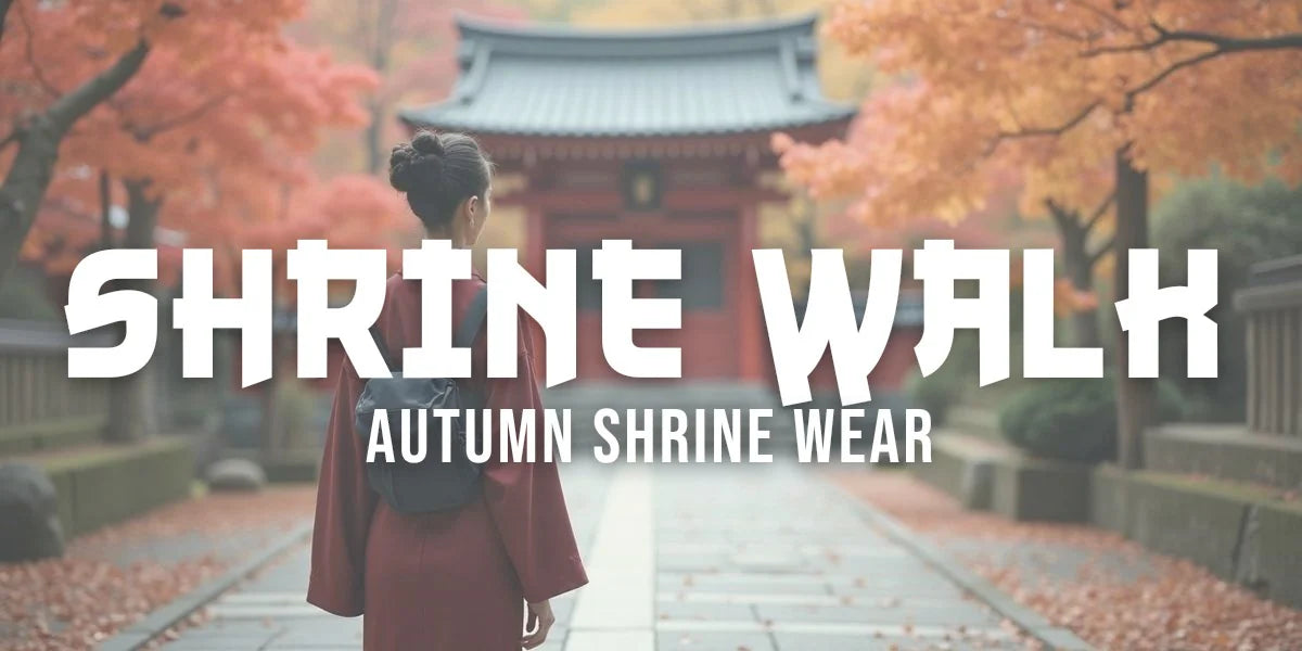 Woman in burgundy kimono and grey haori surrounded by scarlet and golden autumn shrine foliage.