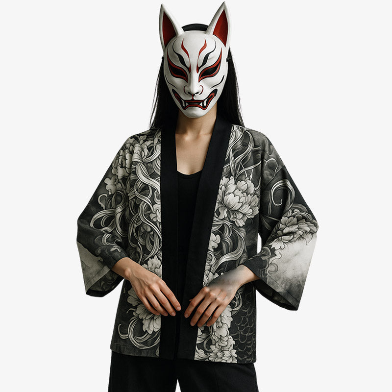 a women is dressed with a casual kimono jacket and traditional kitsune mask
