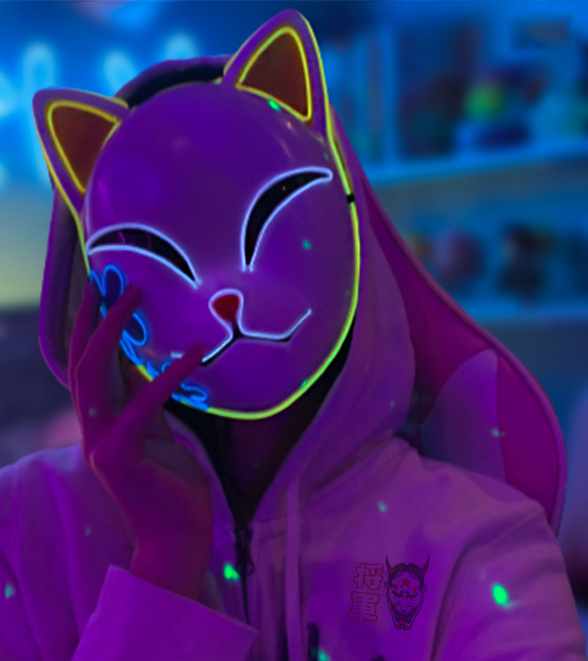 A women wears the demon slayer mask symbolizing the japanese fox demon. The kistune mask glows in the dark