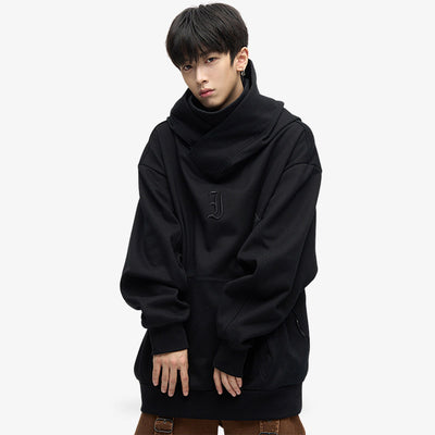 a japanese man is dressed with the Harajuku Tokyo hoodie. Its a black japanese hoodie inspired by black minimalism outfit 