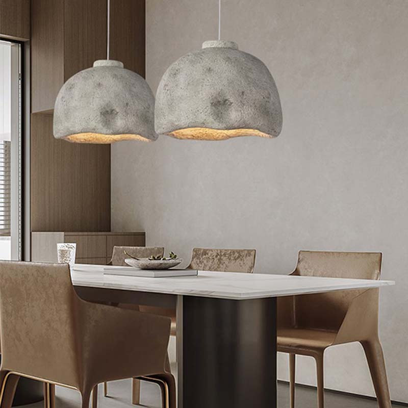 Two Japanese White chandelier in a dining room with a white table and chairs