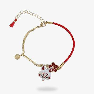 This women's Japanese bracelet is made of rope and chain. Japanese jewel with a Kitsune fox head and a Sakura flower symbol