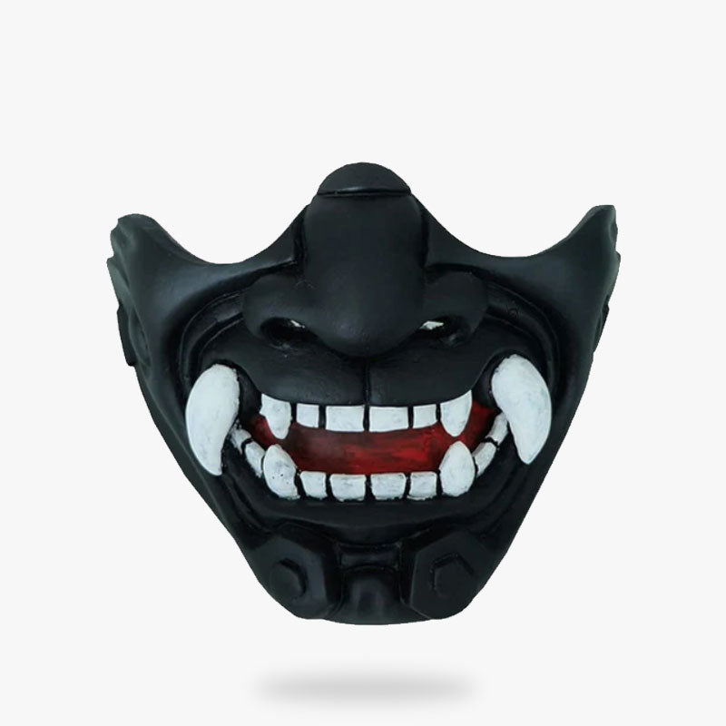 This black mempo mask is a half-face of the Japanese demon Oni. Samurai mask with fangs