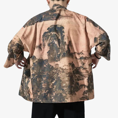 Person wearing a streetwear kimono with a Japanese landscape printed patterned on a white background