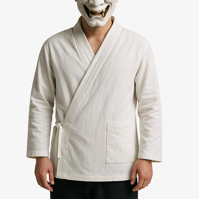 a man is dressed with White kimono cardigan with a clean, minimalist design inspired by traditional Japanese layering garments, perfect for a refined and contemporary look.