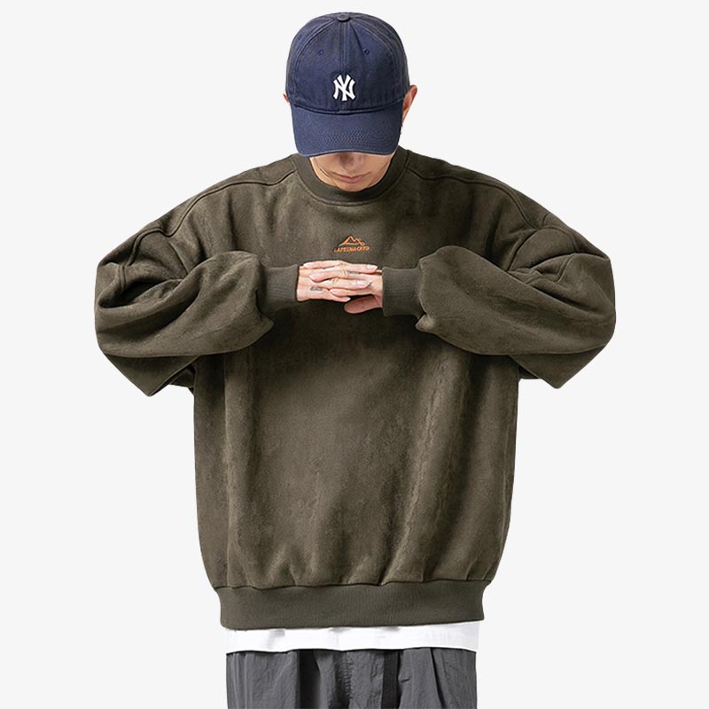 a man is dressed with an Aesthetic Japanese sweatshirt in green, crafted from high-quality Spandex and Polyester, minimalist monochrome green color