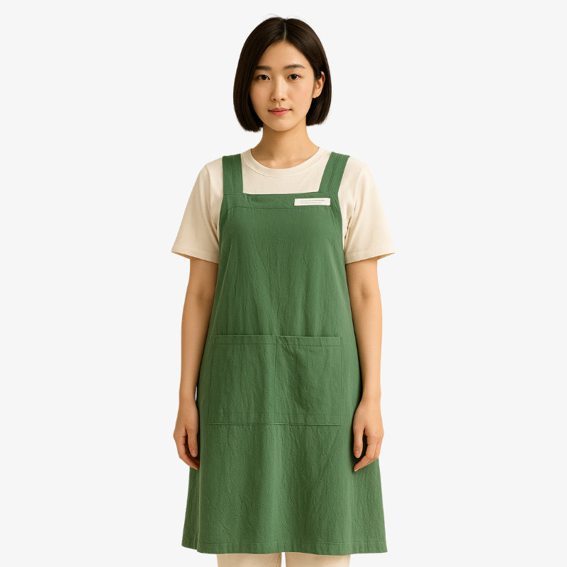 Apron Japanese style constructed from soft linen-cotton blend with cross-back straps for a comfortable fit and versatile use.