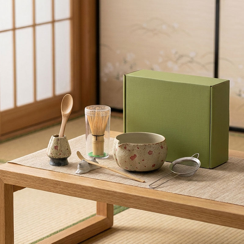 A beautiful matcha set with a green box on a wooden table in a traditional Japanese room.