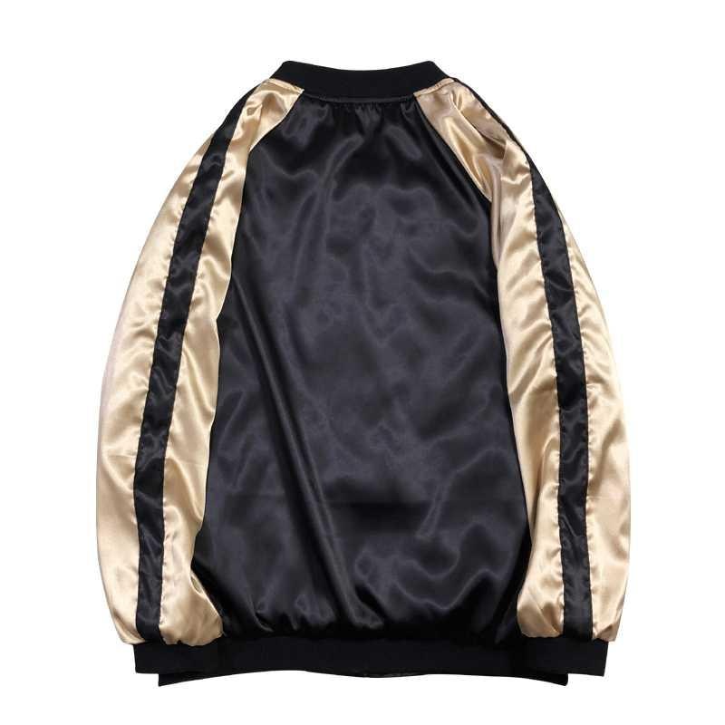 This black and gold souvenir jacket is a sukajan. It' s a japanese bomber jacket made with high quality material