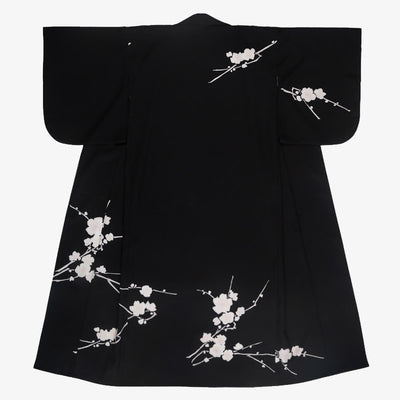 Black and white kimono dress with printed floral designs