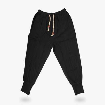 black cargo pants men streetwea for a casual look. The bottom is tightened with two drawstrings at the waist.