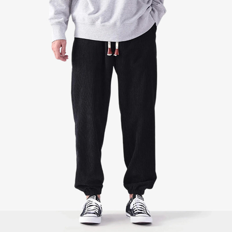 Black corduroy pants combining sleek design with Japanese retro style for japanese fashion outfit clothes.