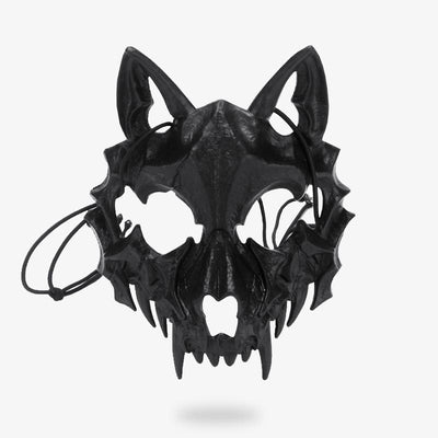 The black Japanese fox mask is the Kitsune demon. The mask is black and skeleton-shaped.