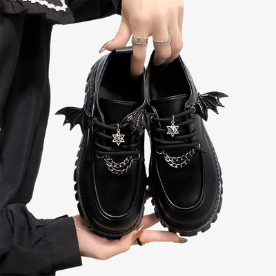 Black kawaii shoes designed with cute and playful elements, adding a touch of Japanese-inspired lolita gothic style