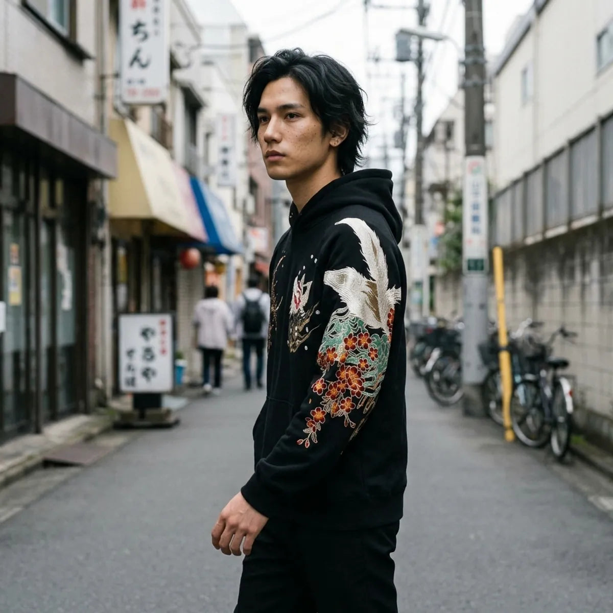Black kitsune sweatshirt caught while walking in Tokyo, the white fox fur and red flowers down the sleeve