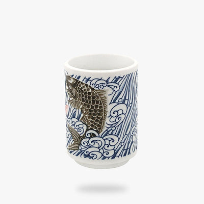 The blue Japanese tea cups feature a detailed koi carp motif, symbolizing courage and perseverance in Japanese culture, beautifully crafted in a serene blue hue.