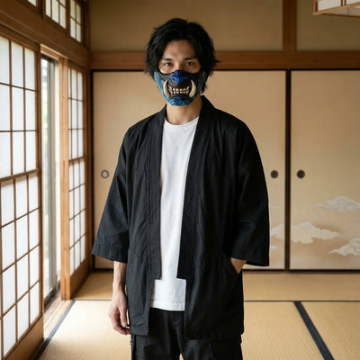 Blue oni half mask with ivory fangs worn in a Japanese tatami room