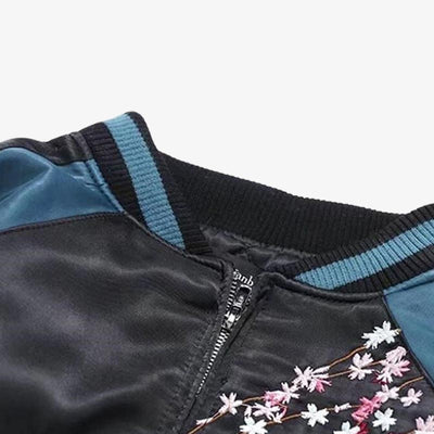 A carp koi jacket Japan Sukajan Bomber collar with a zipper and embroidered flowers on the jacket.