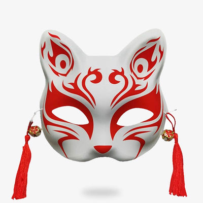 The cat Japanese mask is hand-painted with red motifs.