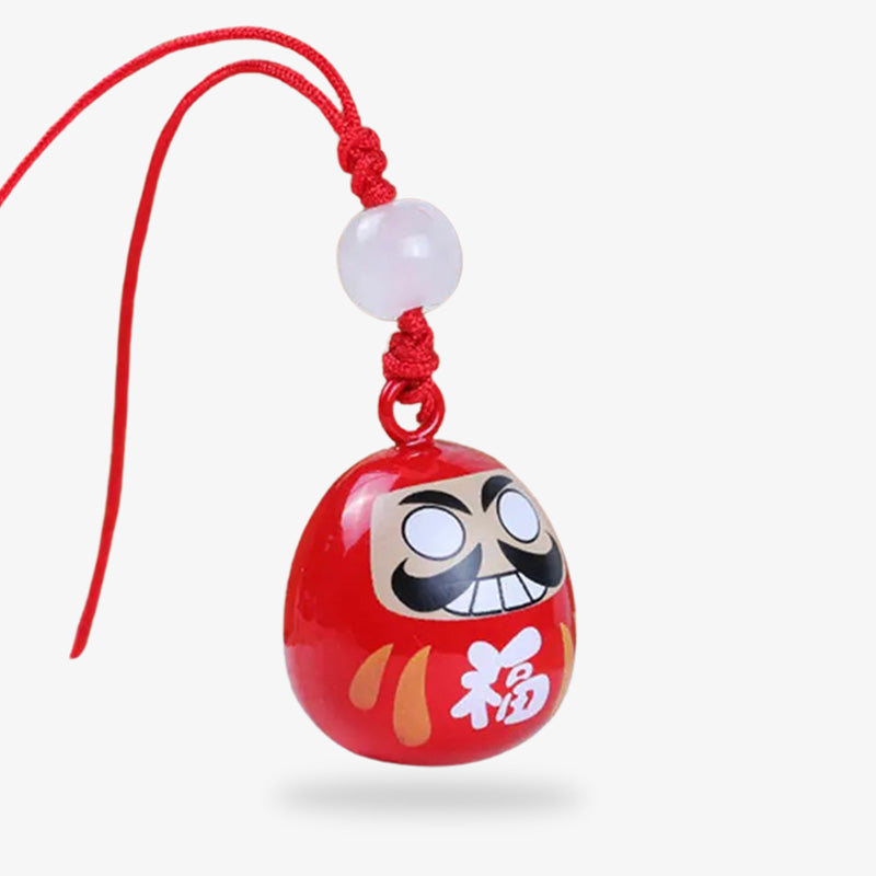 Buy a Daruma keychain, a traditional Japanese lucky charm that represents persistence and the pursuit of one's ambitions