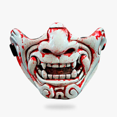 The demon mask samurai is a half face oni demon. The japanese mask is handmade with fiberglass. The mask is white colored with fake blood paintings. The samurai mask has teeths