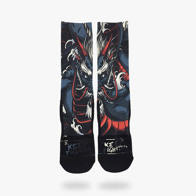 a pair of Japanese dragon socks with a dragon print with horns