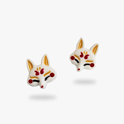 These Japanese earrings are shaped like a Japanese fox mask. Also called Kitsune mask