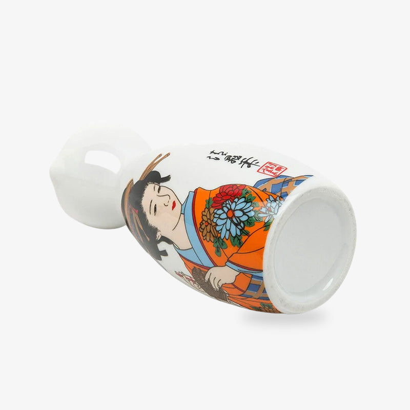 this is a white japanese ceramic Geisha sake bottle adorned with intricate Geisha artwork, adding a touch of traditional Japanese elegance to your sake-serving experience. The geisha painted on this white sake bottle is dressed with a kimono