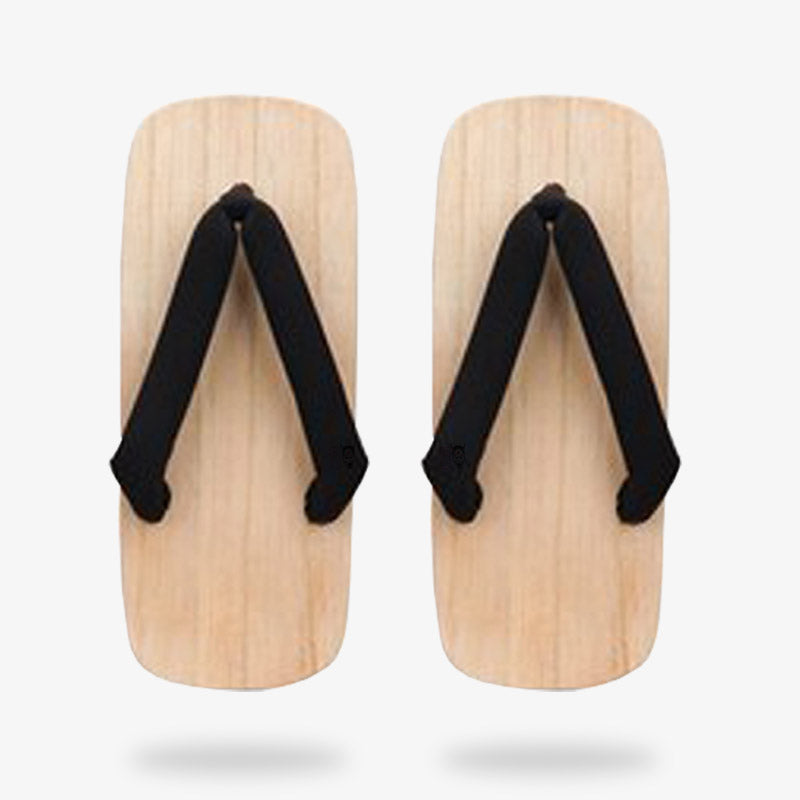 Wooden display of Japanese geta sandals for sale with black straps